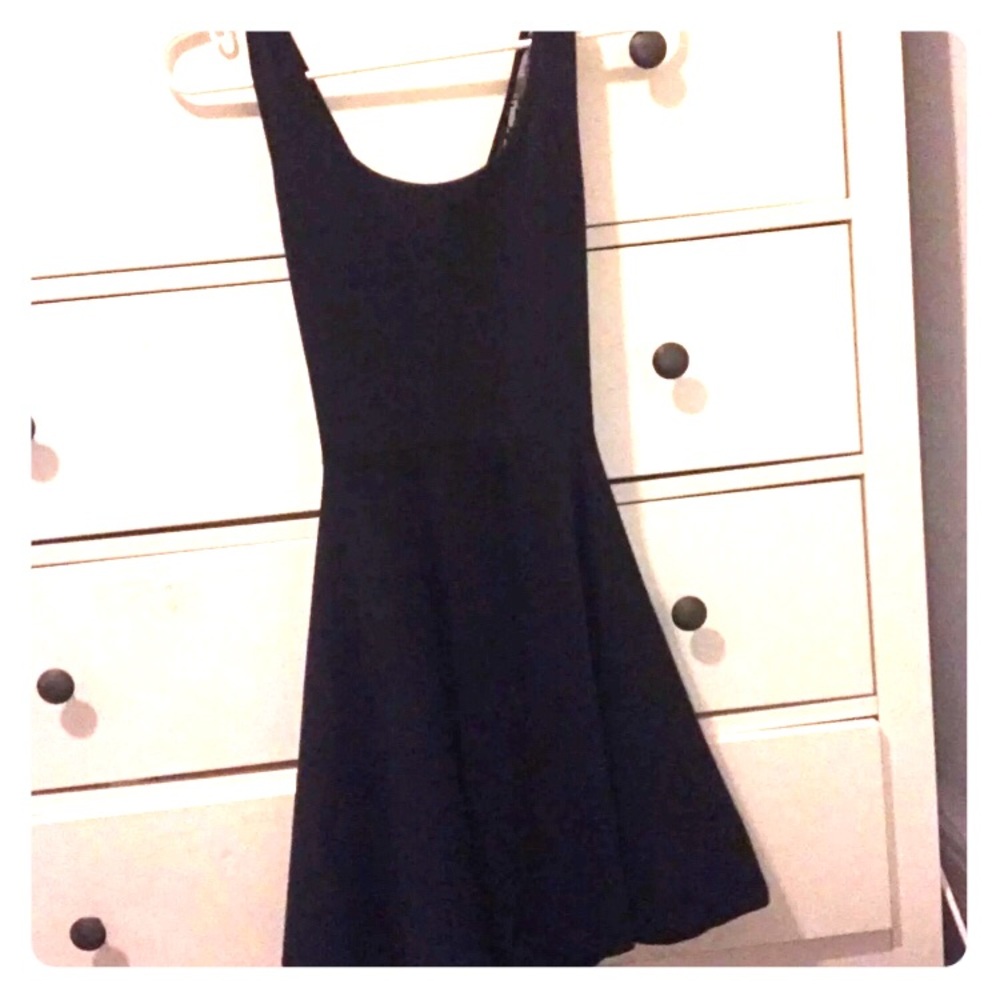 navy blue dress with a see thru criss cross back